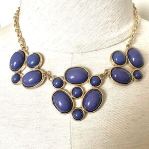 Gold tone blue statement necklace